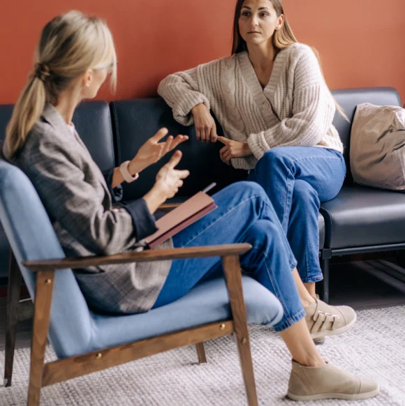 3 Individual speaking with a therapist during counselling