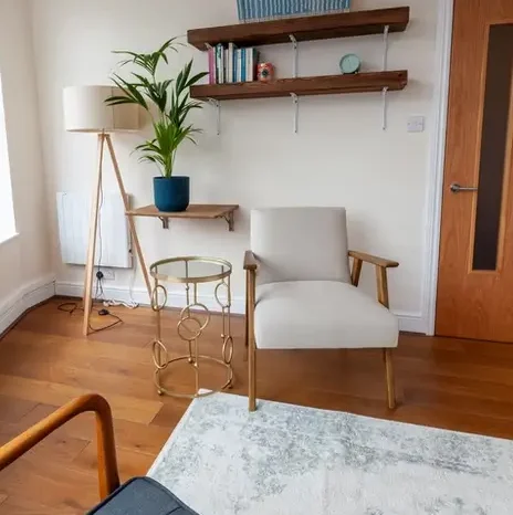 Therapy room with armchairs and natural light